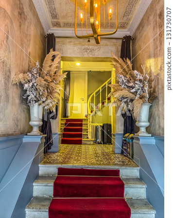 Elegant Hallway with Red Carpet and Pampas Decor 131730707