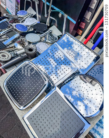 Variety of Metal Shower Heads Displayed at Market 131730709