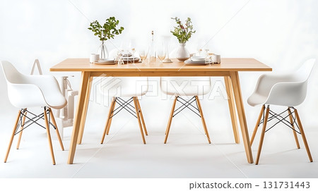 A wooden dining table with white chairs and a vase of flowers on it 131731443
