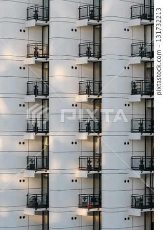 metal railing balconies, white facade building metal railing balconies, white facade building 131732213