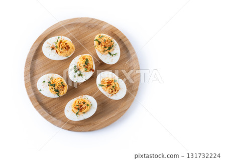 Homemade hard Boiled Deviled Eggs garnished with herbs Homemade hard Boiled Deviled Eggs garnished with herbs 131732224