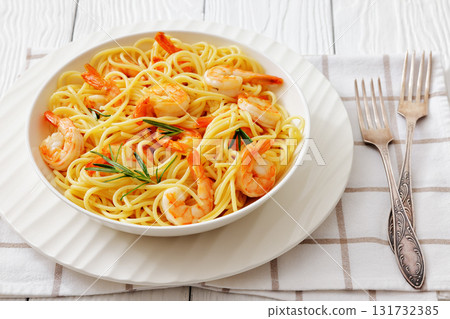 yummy spaghetti with shrimps in a white bowl 131732385