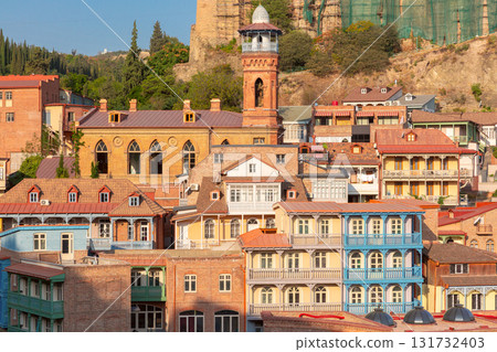 Colorful balconies and mosque tower in Tbilisi Georgia Colorful balconies and mosque tower in Tbilisi Georgia 131732403