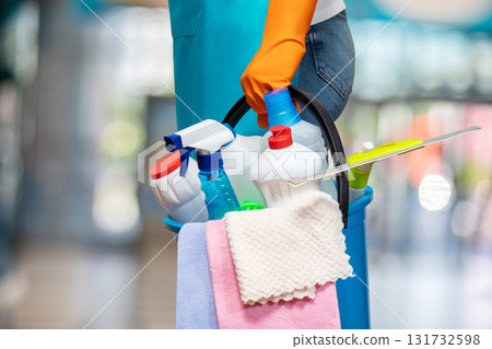 Cleaning supplies ready for a fresh start in a bright space. Cleaning supplies ready for a fresh start in a bright space. 131732598