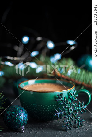 Teal Mug with Hot Chocolate and Snowflake Ornament in Festive Christmas Setting 131732648