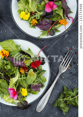 Vibrant Edible Flower Salad. 131733498