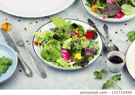 Vibrant Edible Flower Salad. 131733499