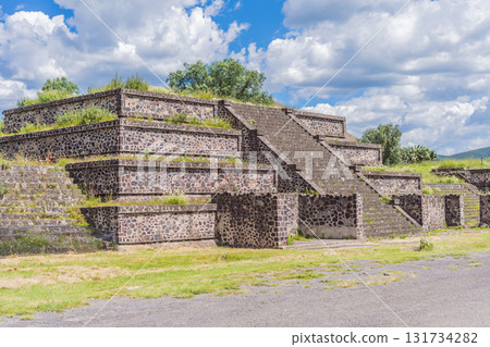 Teotihuacan in Mexico, showcasing iconic ancient pyramids and cultural heritage. Tourism, adventure, and historic exploration concept Teotihuacan in Mexico, showcasing iconic ancient pyramids and cultural heritage. Tourism, adventure, and historic exploration concept 131734282