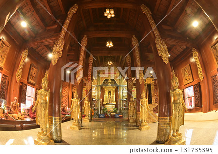 The statue of Phra Chao Pantan Buddha is enshrined in a teakwood chapel at Wat Den Sali Si Mueang Kaen temple or Wat Ban Den. Located at Chiang Mai Province in Thailand. The statue of Phra Chao Pantan Buddha is enshrined in a teakwood chapel at Wat Den Sali Si Mueang Kaen temple or Wat Ban Den. Located at Chiang Mai Province in Thailand. 131735395