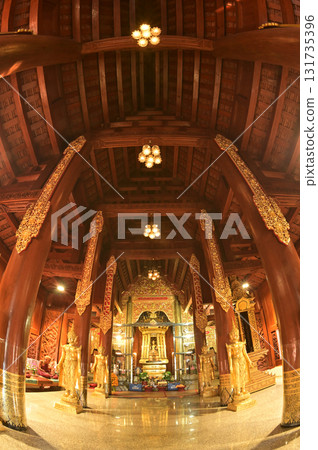 The statue of Phra Chao Pantan Buddha is enshrined in a teakwood chapel at Wat Den Sali Si Mueang Kaen temple or Wat Ban Den. Located at Chiang Mai Province in Thailand. The statue of Phra Chao Pantan Buddha is enshrined in a teakwood chapel at Wat Den Sali Si Mueang Kaen temple or Wat Ban Den. Located at Chiang Mai Province in Thailand. 131735396