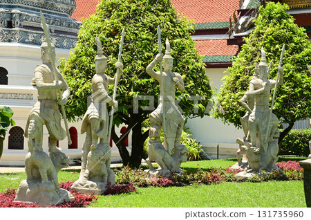 Outdoor statues of soldiers and warriors in Thai art decorate at Wat Phra Sri Rattana Satsadaram or Wat Phra Kaew.This temple is the most popular temple for tourists to visit and pay homage to. Outdoor statues of soldiers and warriors in Thai art decorate at Wat Phra Sri Rattana Satsadaram or Wat Phra Kaew.This temple is the most popular temple for tourists to visit and pay homage to. 131735960