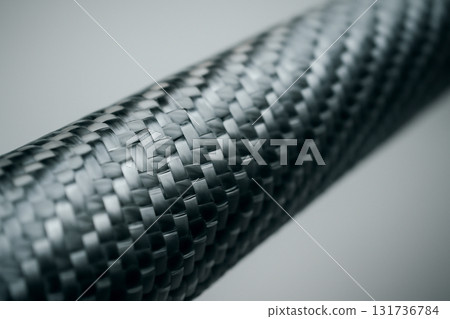 AI generated close-up of carbon fiber weave, showcasing its intricate texture and modern design. Perfect for technology and industrial themed visuals. Sharp focus clear presentation. AI generated close-up of carbon fiber weave, showcasing its intricate texture and modern design. Perfect for technology and industrial themed visuals. Sharp focus clear presentation. 131736784