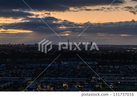 Sky Tower and sunset as seen from Mount Wellington in Auckland, New Zealand 131737038