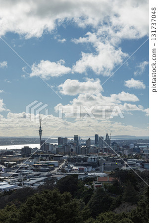 View of the Sky Tower and the city from the top of Mount Eden in Auckland, New Zealand 131737048