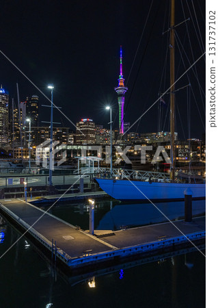 Night view of the Sky Tower and Yacht Harbour from the Viaduct in Auckland, New Zealand 131737102