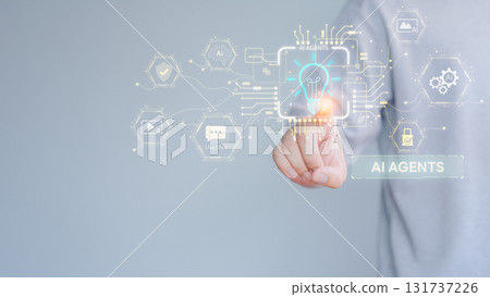 Person pointing virtual glowing lightbulb with AI Agents icon, circuits, and digital element. Concept of artificial intelligence, learning, innovation, automation, data technology and smart solutions. Person pointing virtual glowing lightbulb with AI Agents icon, circuits, and digital element. Concept of artificial intelligence, learning, innovation, automation, data technology and smart solutions. 131737226