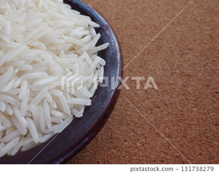 Basmati rice in a small bowl Basmati rice in a small bowl 131738279