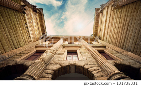 Looking up at the historic stone building Looking up at the historic stone building 131738331