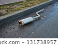 Exhaust pipe fallen of a junker car 131738957