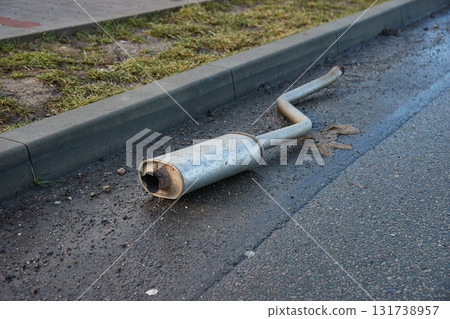 Exhaust pipe fallen of a junker car 131738957