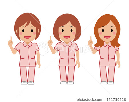 A female nurse in a pink uniform posing as number one A female nurse in a pink uniform posing as number one 131739228