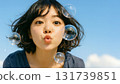 Soap bubbles and girl copy space 131739851