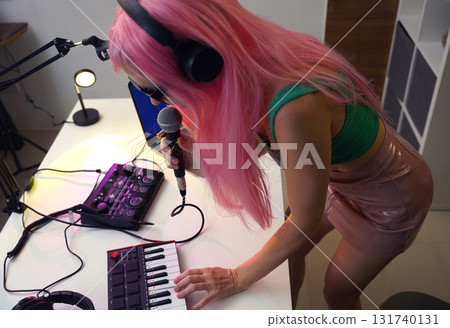 Beautiful young singer and musician broadcast from her home studio 131740131