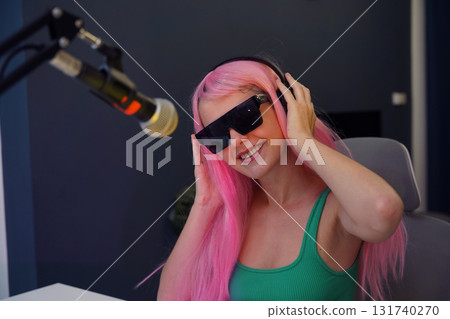 Beautiful young singer and musician broadcast from her home studio 131740270