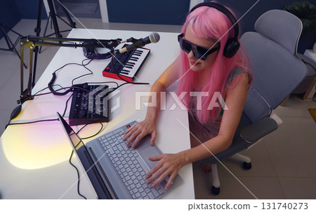 Beautiful young singer and musician broadcast from her home studio 131740273