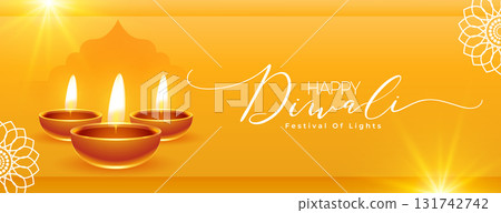 happy diwali wishes yellow banner with glowing diya 131742742