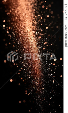 Abstract golden glitter particles on a black background. 131743971