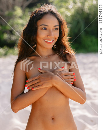 Attractive woman with tanned nudity body, portrait of smiles asian woman 131744163