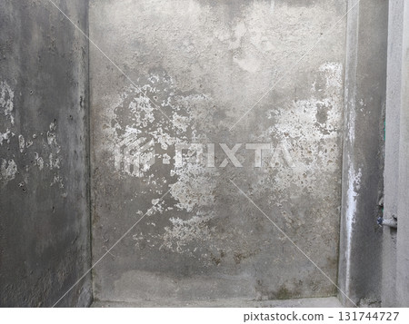 Interior wall showing white powder after plaster work representing incomplete renovation process 131744727