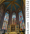 Altar and stained glass of St. Vitus Cathedral | Historic religious architecture in Prague, Czech Republic 131745152