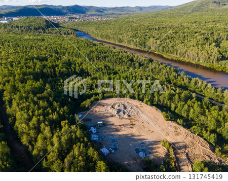 Vast green landscape with river and construction site in Vladivostok, Russia 131745419