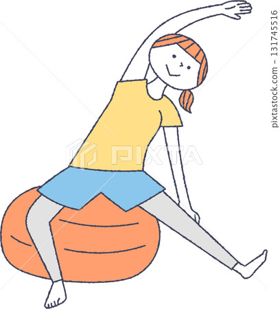 A woman stretching with a balance ball 131745516