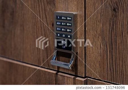 Digital locker lock keypad in public changing room 131748096