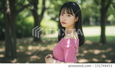 An off-shoulder woman looking back gently 131748453