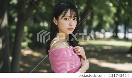 An off-shoulder woman looking back gently 131748454