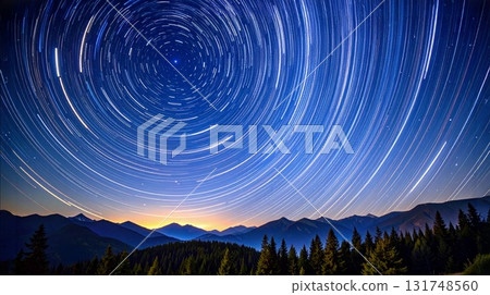 A starry sky with linear star trails rotating around the North Star A starry sky with linear star trails rotating around the North Star 131748560