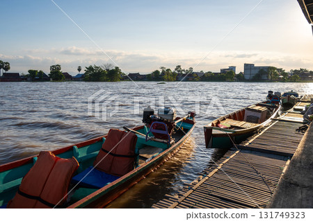 Bujis fishing boat near floating house, Lake Tempe, Indonesia Bujis fishing boat near floating house, Lake Tempe, Indonesia 131749323