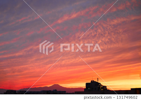 A beautiful townscape with a sunset overlooking Mt. Fuji 131749602