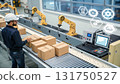 Focused male worker managing automation in smart factory. Industry 4.0 technology with robot arm on conveyor belt manufacturing workflow 131750527