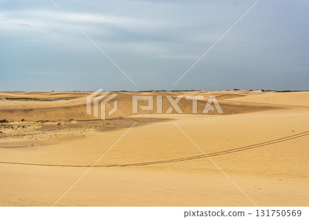 Dunes and lagoons of Atins, Lencois Maranhenses, Barreirinhas, Brazil. White sand dunes with pools of fresh water Dunes and lagoons of Atins, Lencois Maranhenses, Barreirinhas, Brazil. White sand dunes with pools of fresh water 131750569