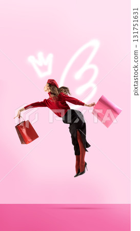 Digital artwork. Elegant woman in red jumping with shopping bags, glowing crown and wings graffiti Digital artwork. Elegant woman in red jumping with shopping bags, glowing crown and wings graffiti 131751631