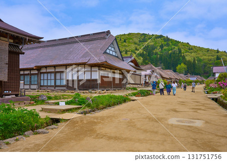 Fresh greenery in Shimogo Town, Minamiaizu County, Fukushima Prefecture. Looking north at the thatched roofs of Ouchijuku. 131751756