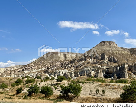 A valley on a clear summer day, a wilderness on a rocky mountain 131751936