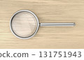 Silver magnifying glass 131751943
