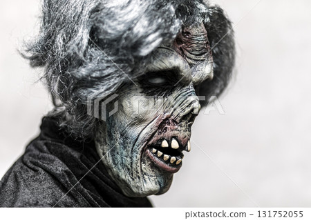 Portrait of a scary zombie with gray hair Portrait of a scary zombie with gray hair 131752055