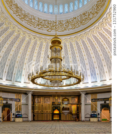 Jame' Asr Hassanil Bolkiah Mosque, Bandar Seri Begawan, Brunei. Interior with golden dome, chandelier, and Arabic calligraphy Jame' Asr Hassanil Bolkiah Mosque, Bandar Seri Begawan, Brunei. Interior with golden dome, chandelier, and Arabic calligraphy 131752960
